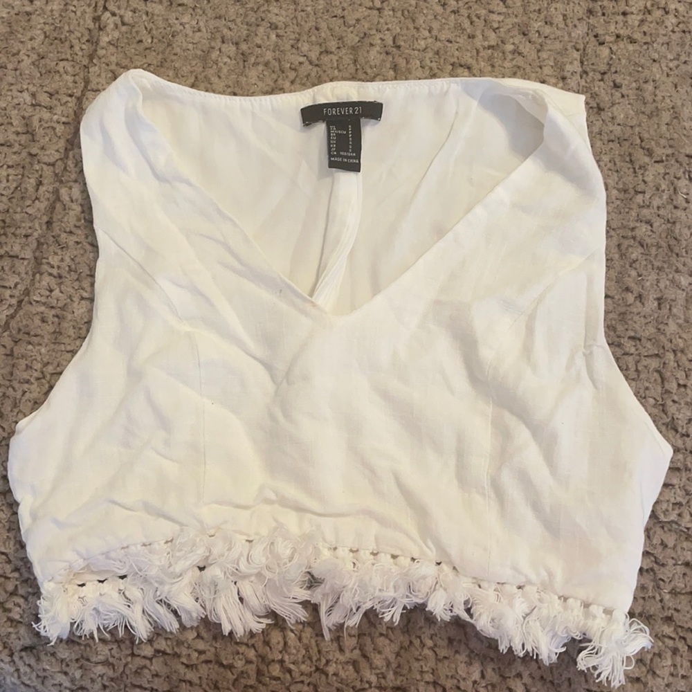 white cropped tank top with tassels